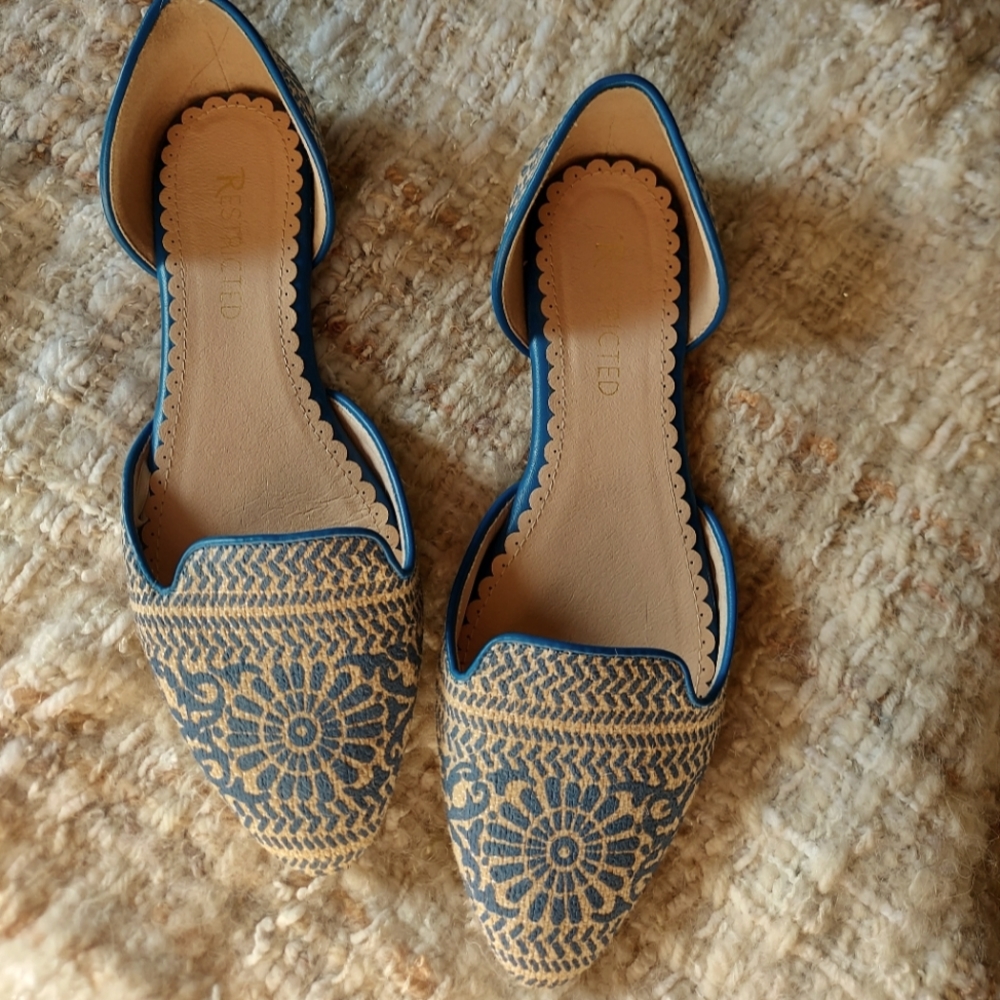 Blue and cream flats